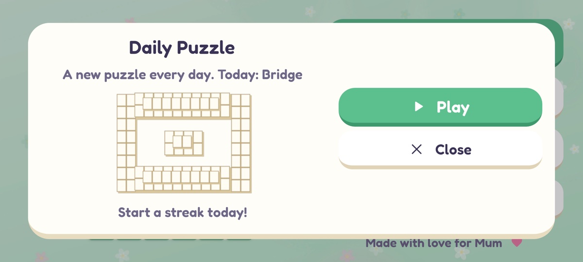The daily puzzle with its layout preview and streak counter